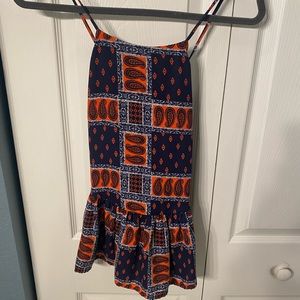 Peplum Top with Cross Strap Back